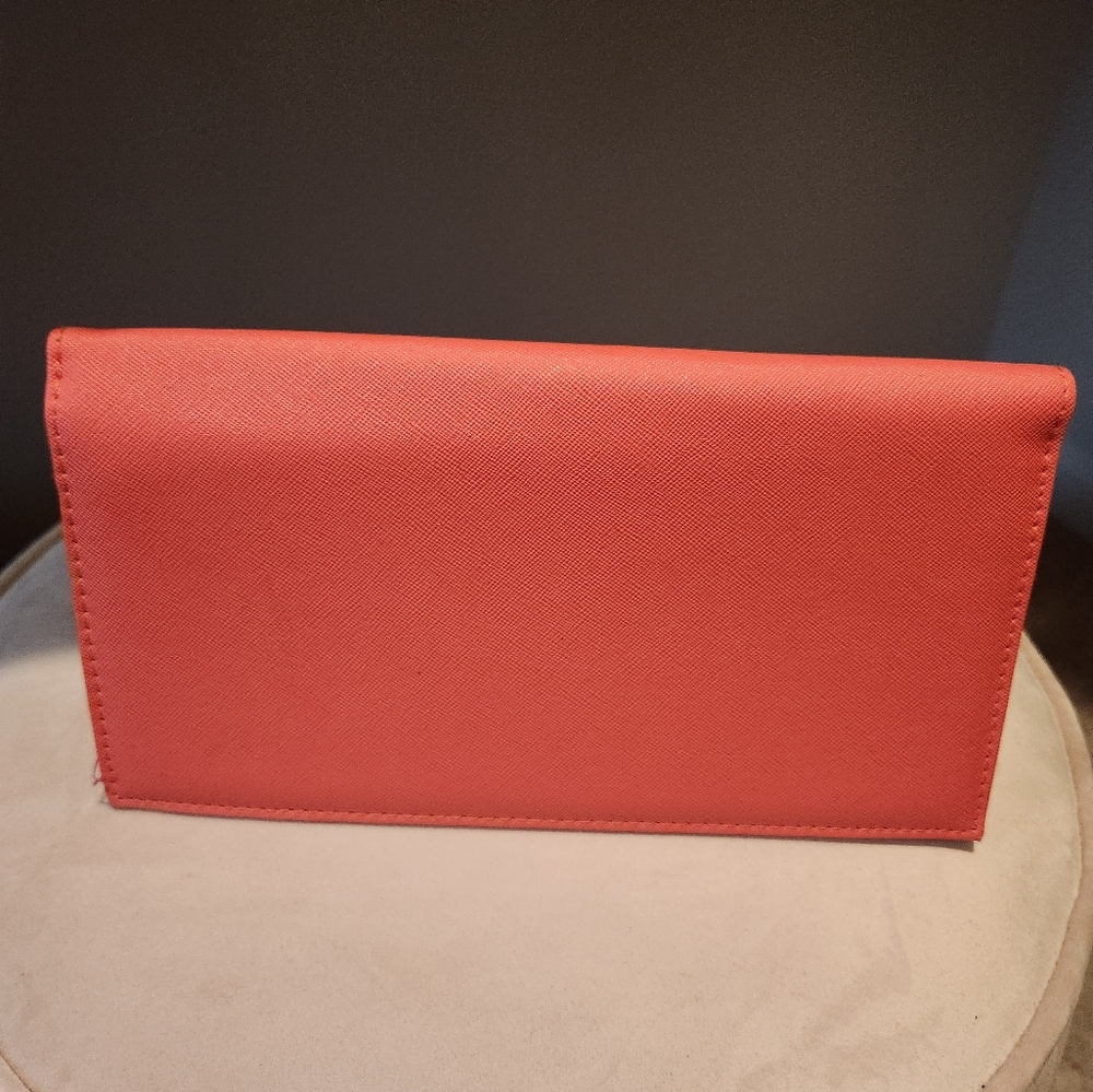 Neiman Marcus Clutch with passport holder Condition: Used Like New